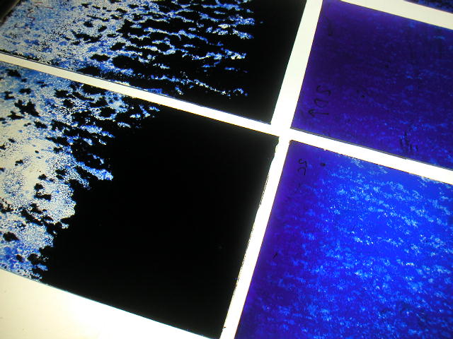 Air window — large arched cobalt blue, two vertical presences